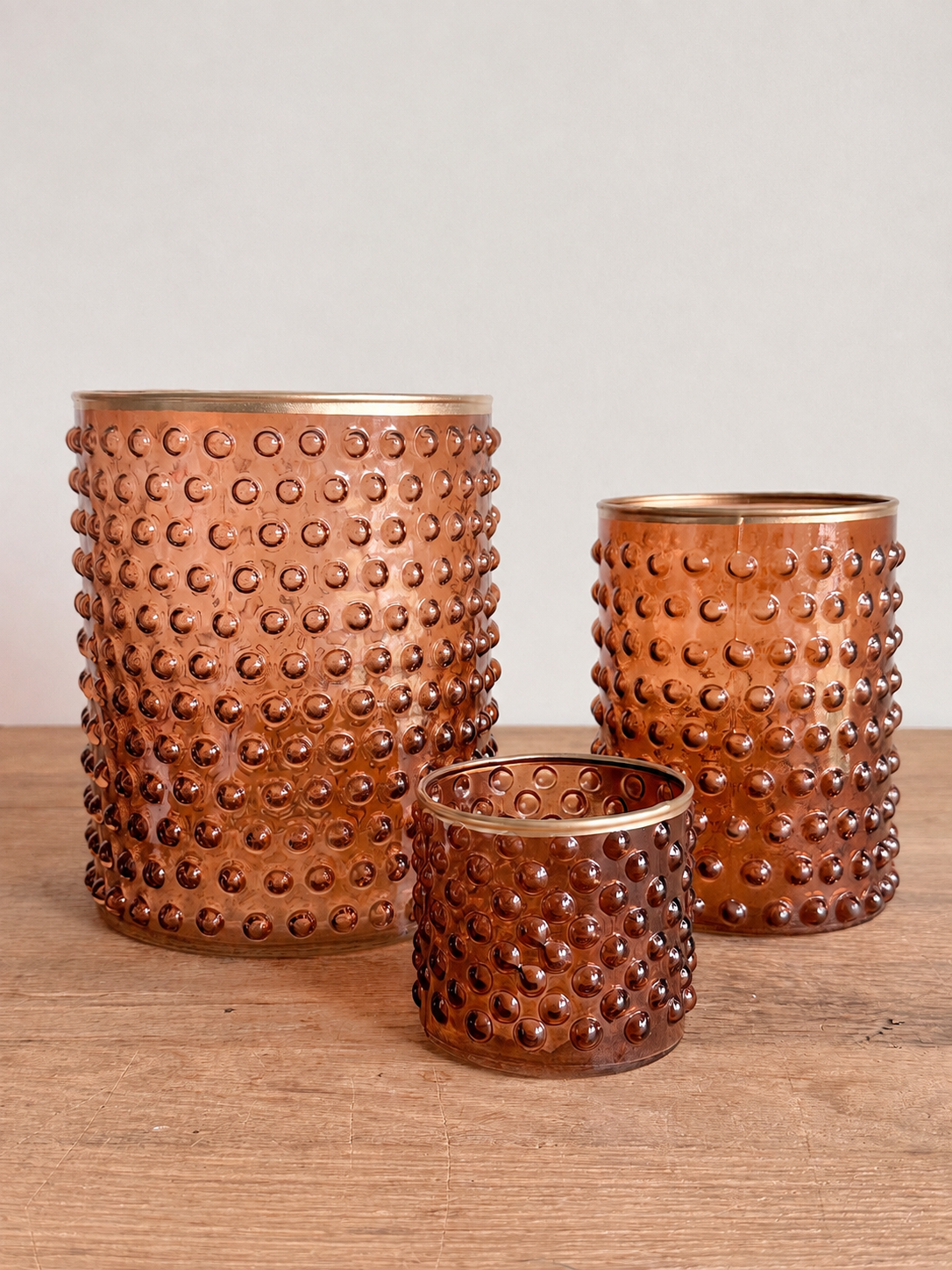 Collection of Brown Glass Hobnail Hurricanes