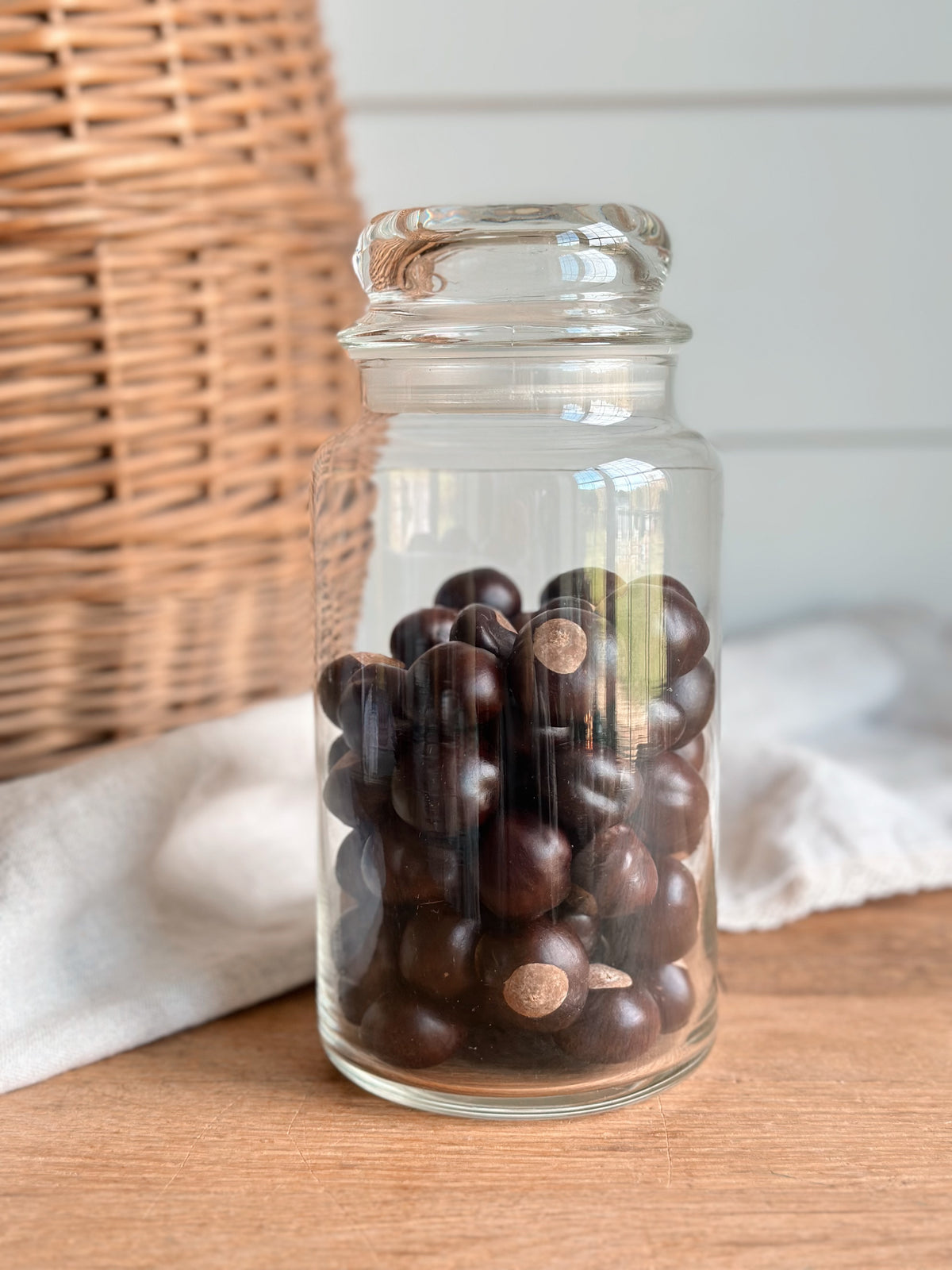 Collection of Chestnuts in a Glass Canister